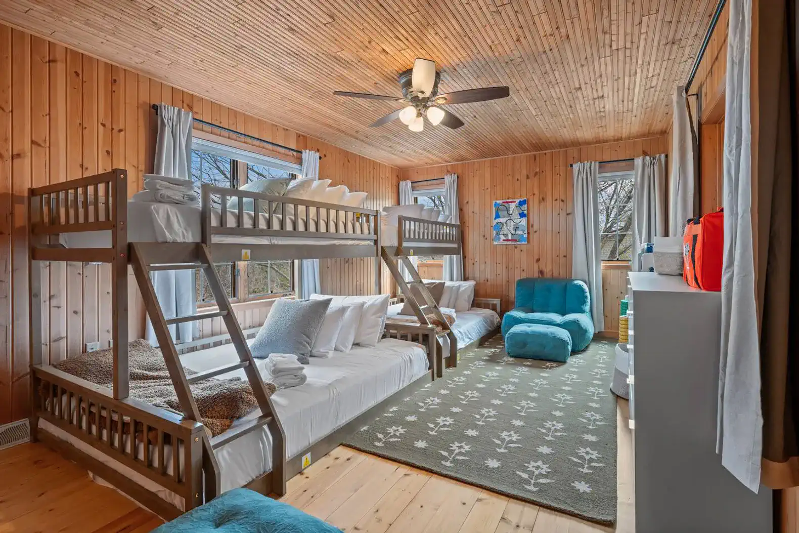 Second-Floor Bedroom: Two bunk beds (twin over full) comfortably sleep up to four adults or six kids. Features a Smart TV and a selection of games for fun and relaxation.