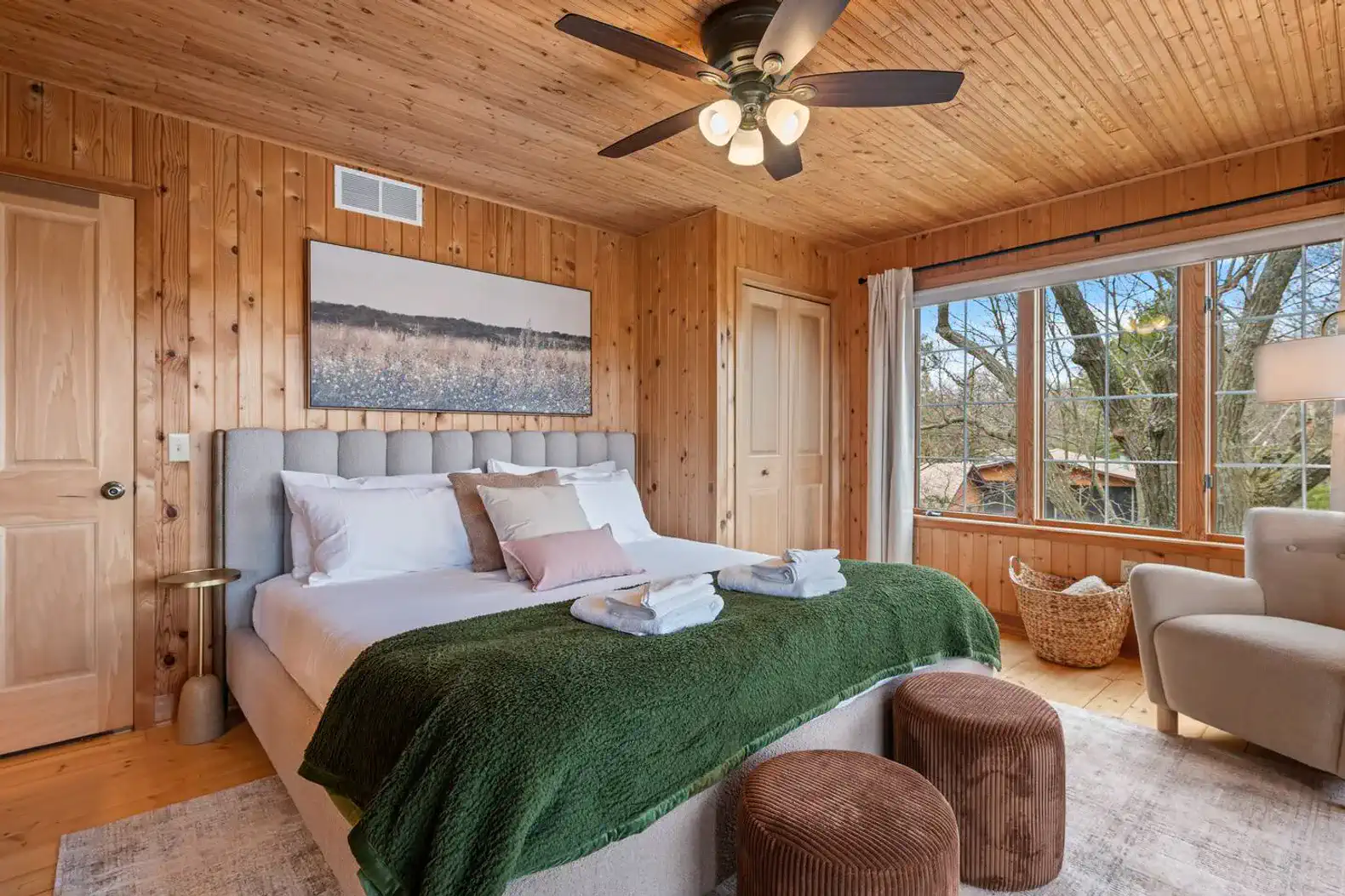 Second-floor king suite with private screened porch.