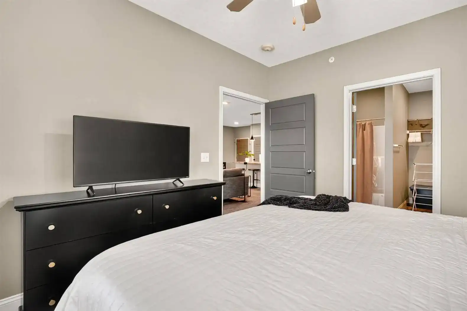 The primary bedroom also offers a smart TV for streaming, a full size dresser and its own ensuite bathroom for added convenience.