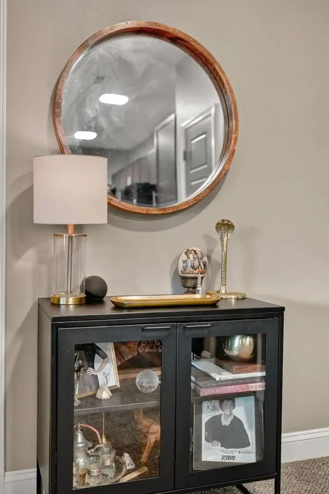 Step into style with a modern entryway featuring sleek console table, accent mirror, and curated décor.