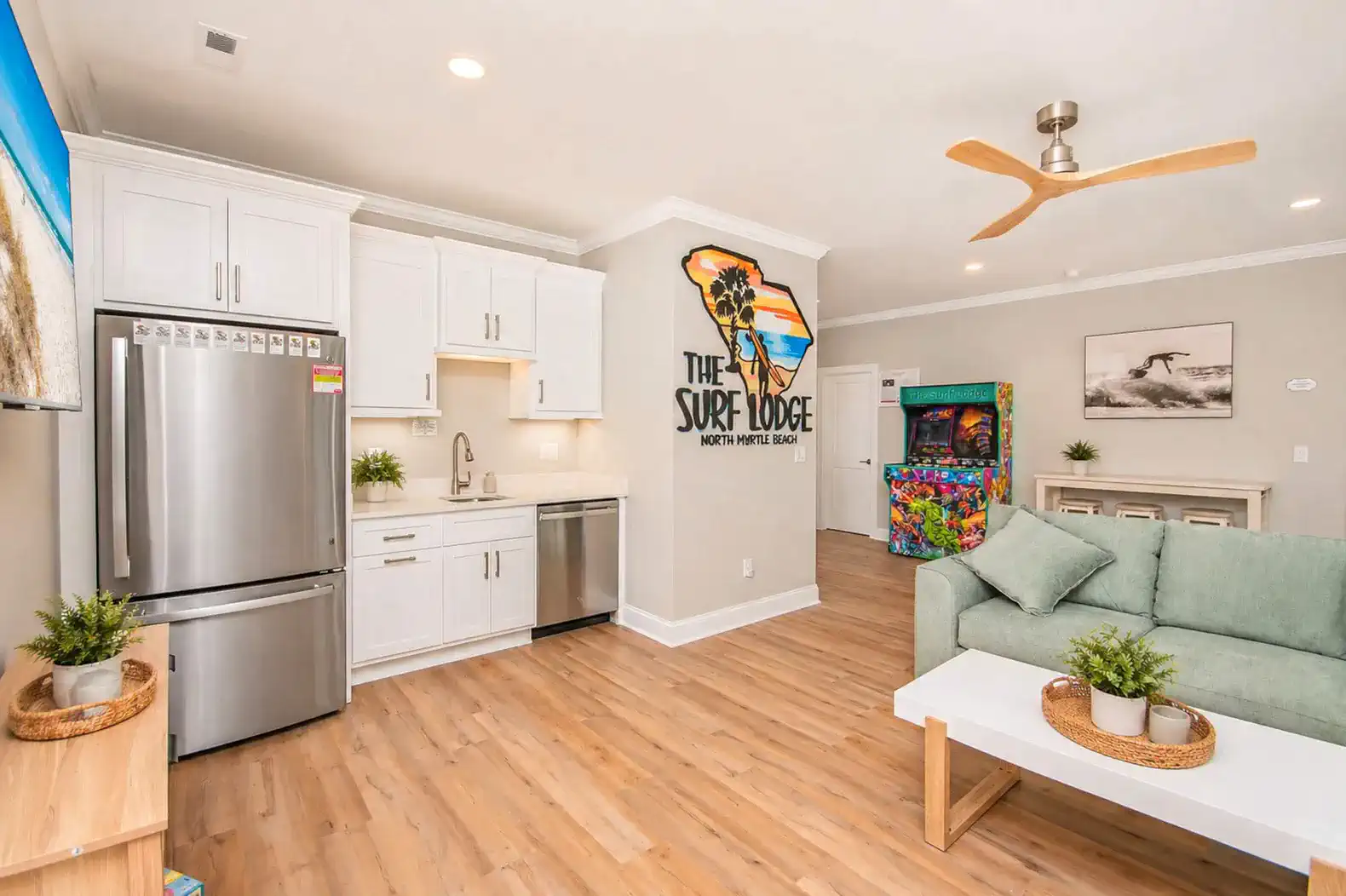 Game Room Kitchenette with full-sized Fridge, dishwasher, glasses and plates
