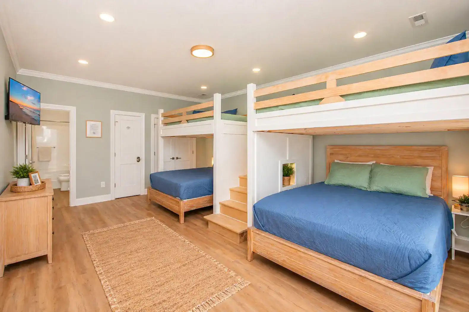 Stairs lead the way to the upper bunks