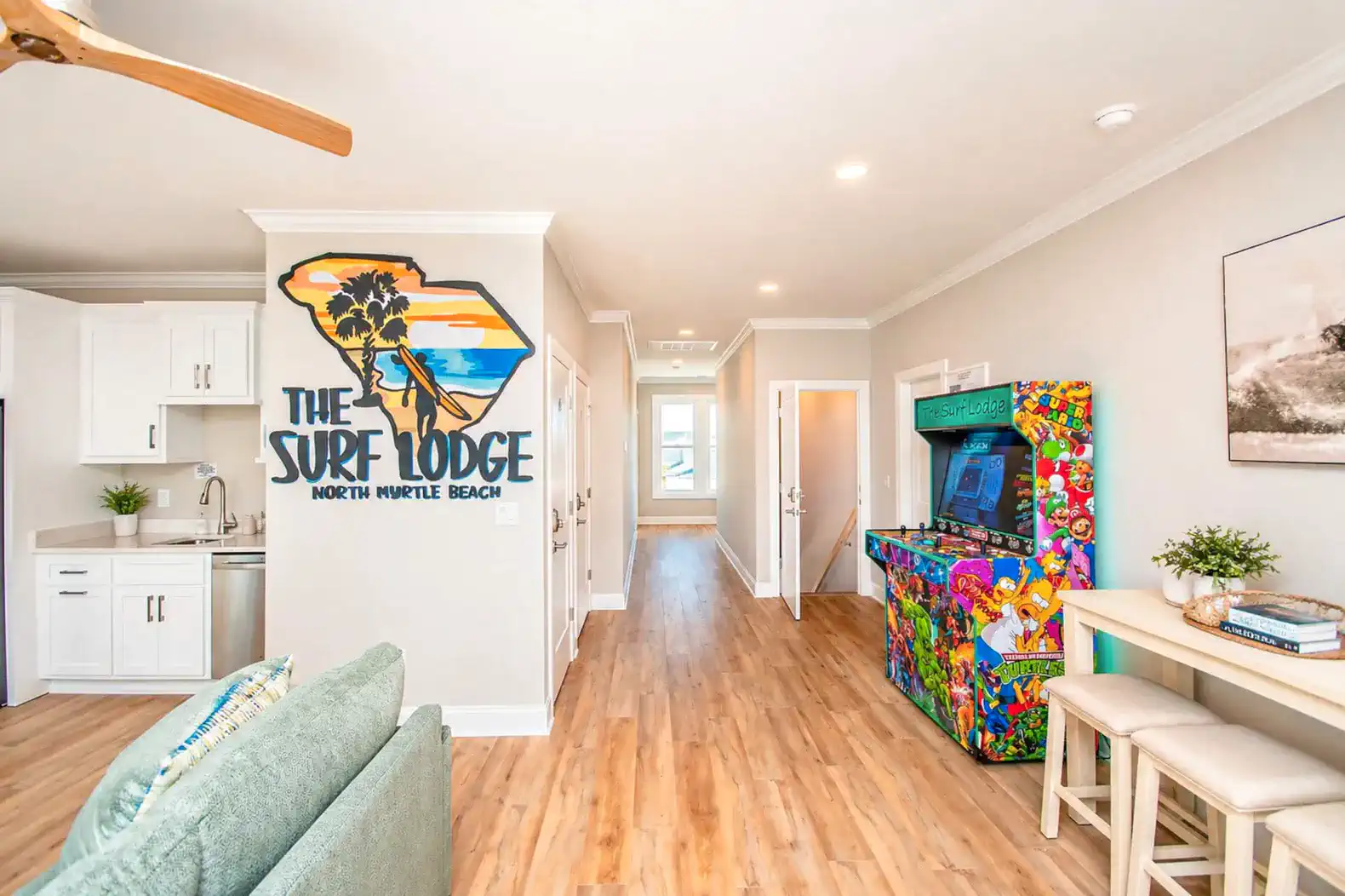 The Surf Lounge-Hang out in the Upper Level.  Complete with four player video gaming system and wet bar