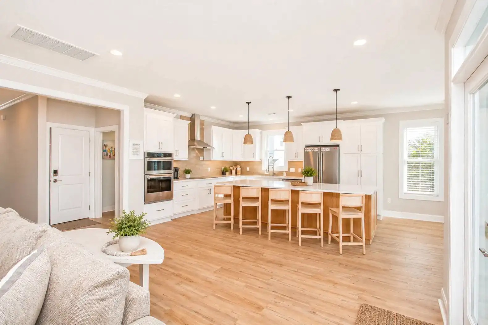 Spacious modern kitchen with large island and bar seating