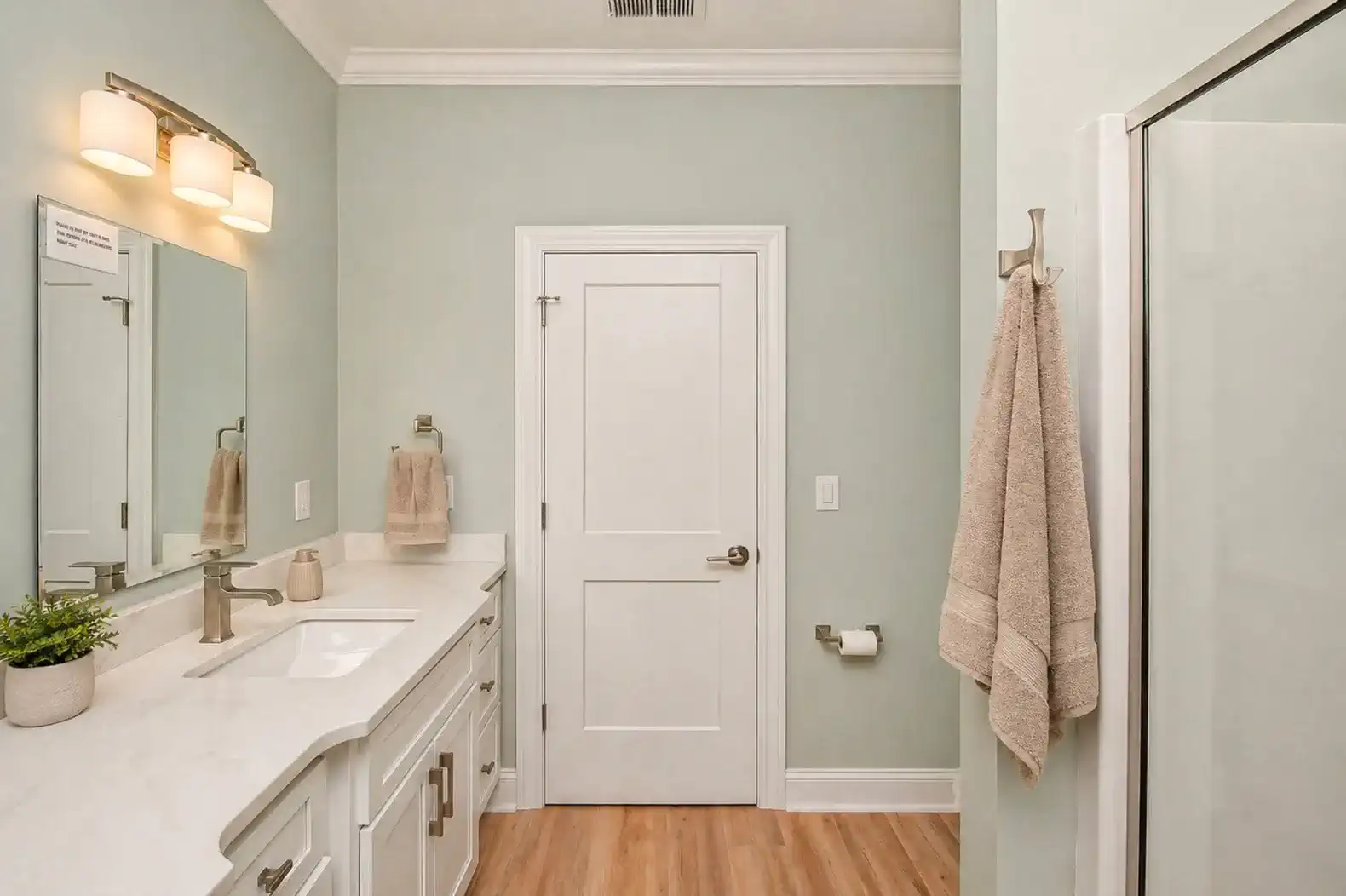 Spacious bathroom with double vanity and modern fixtures