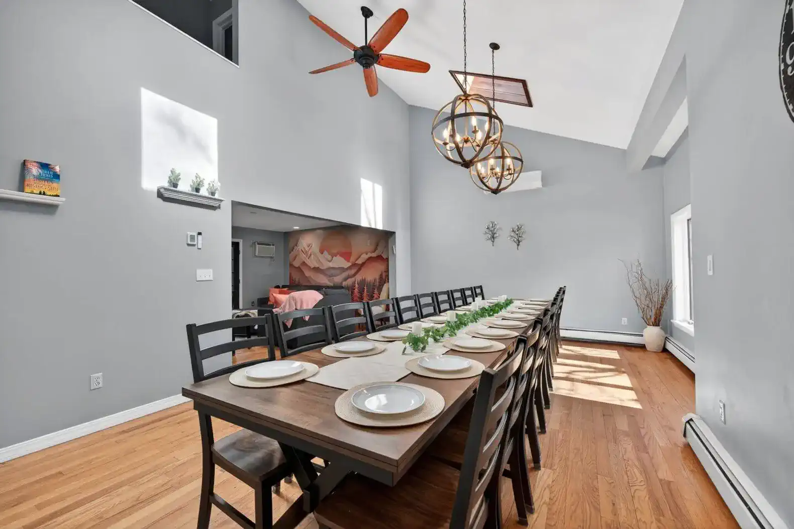 Vaulted great room with 20-seat table and cozy TV lounge