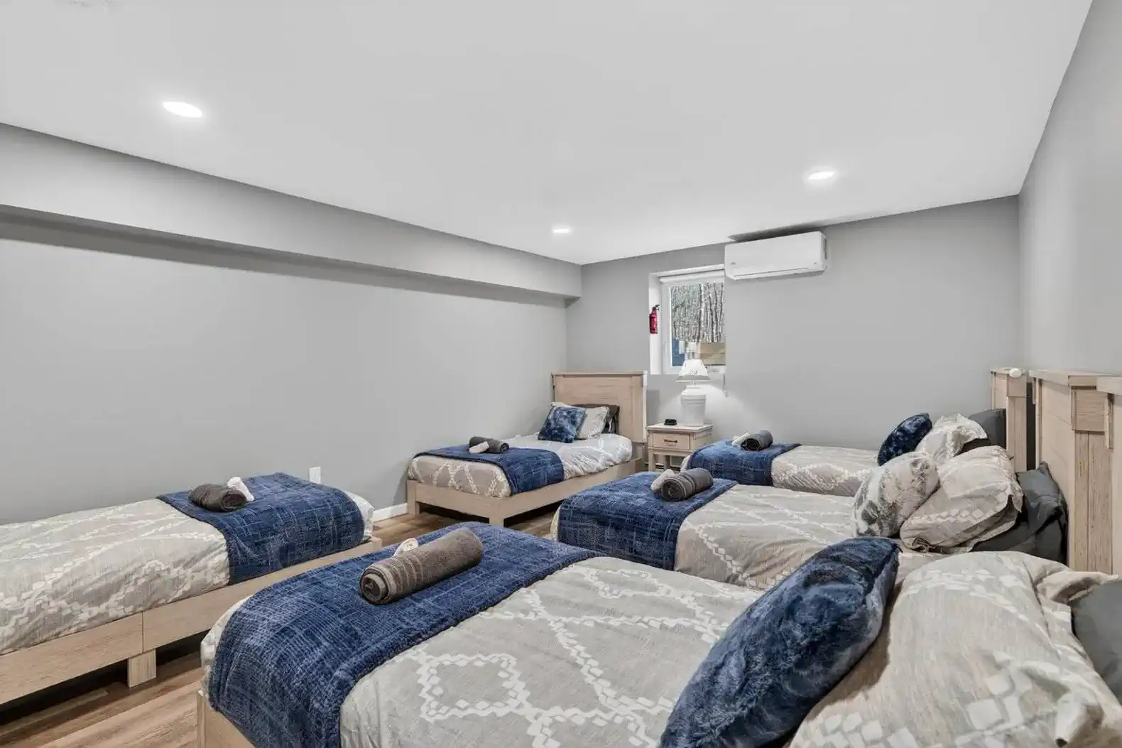 Spacious bunk-style room with 5 twin beds & A C—great for groups