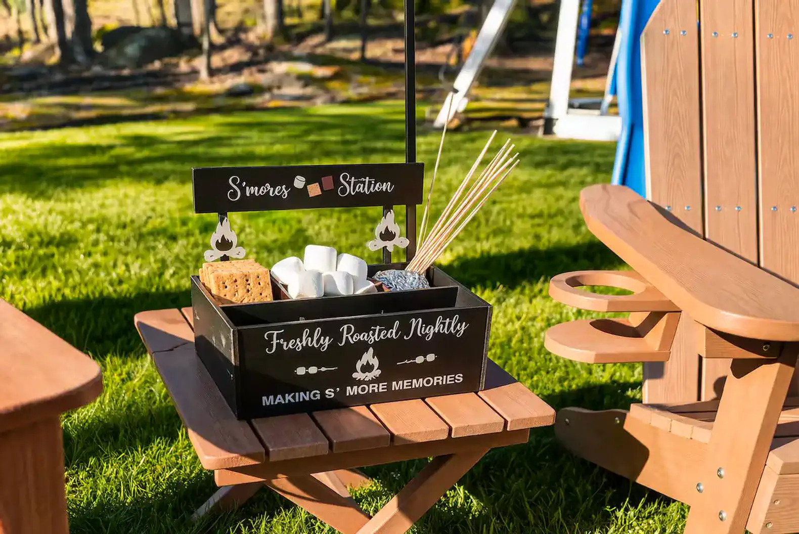 Cozy s’mores station by Adirondack seating—family fun under the stars.