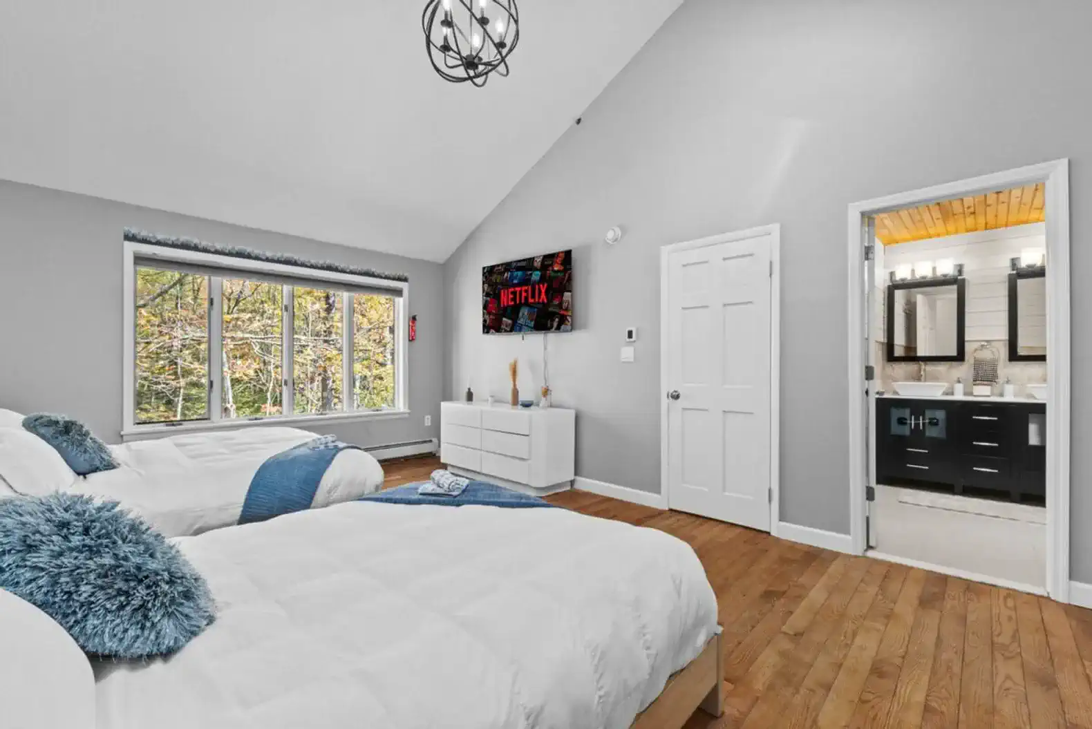 Bright and airy retreat with Smart TV and cozy linens—perfect for relaxing movie nights.