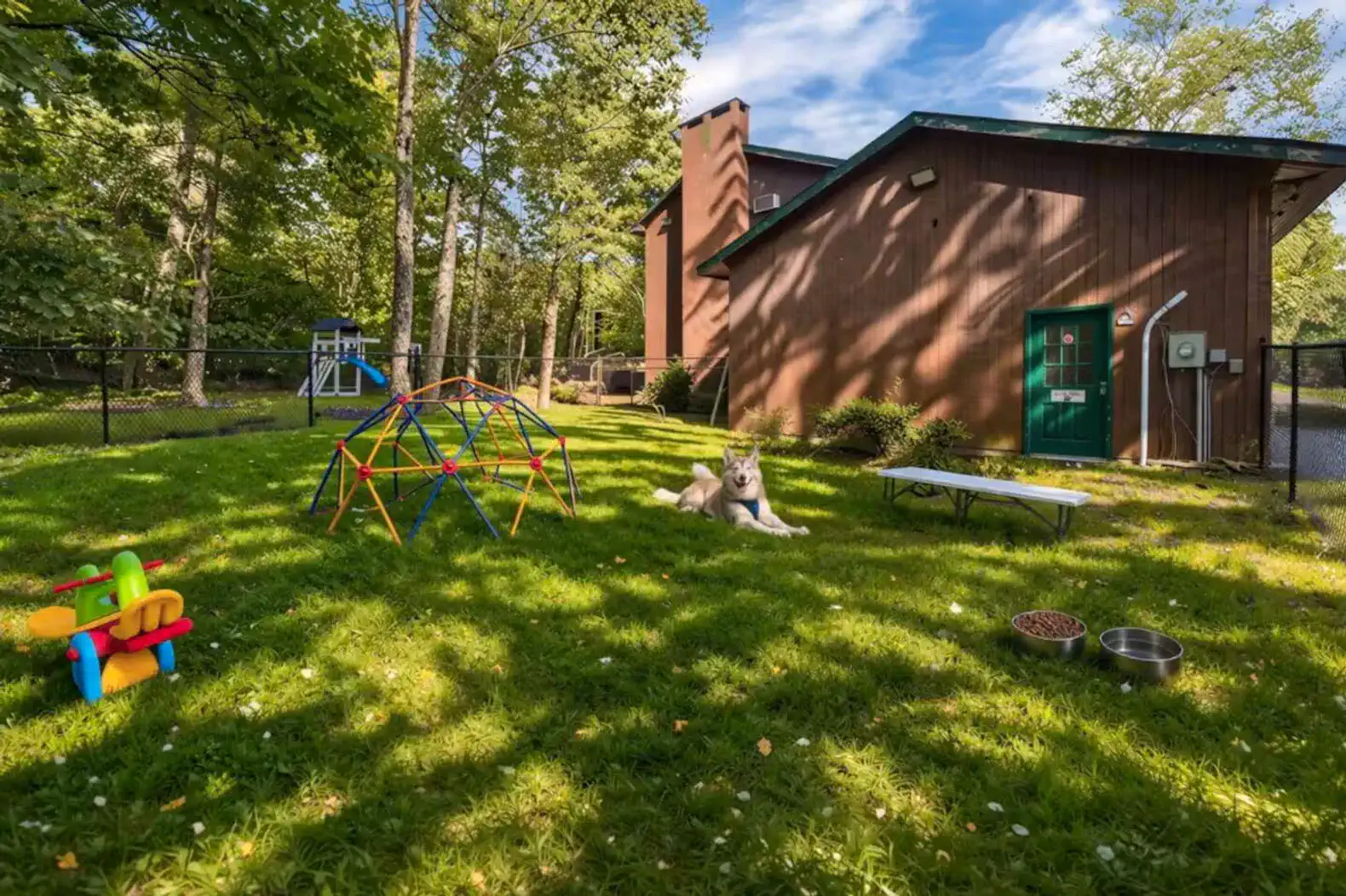 fenced in area, perfect for your furry friends or a safe space for children of all ages to play