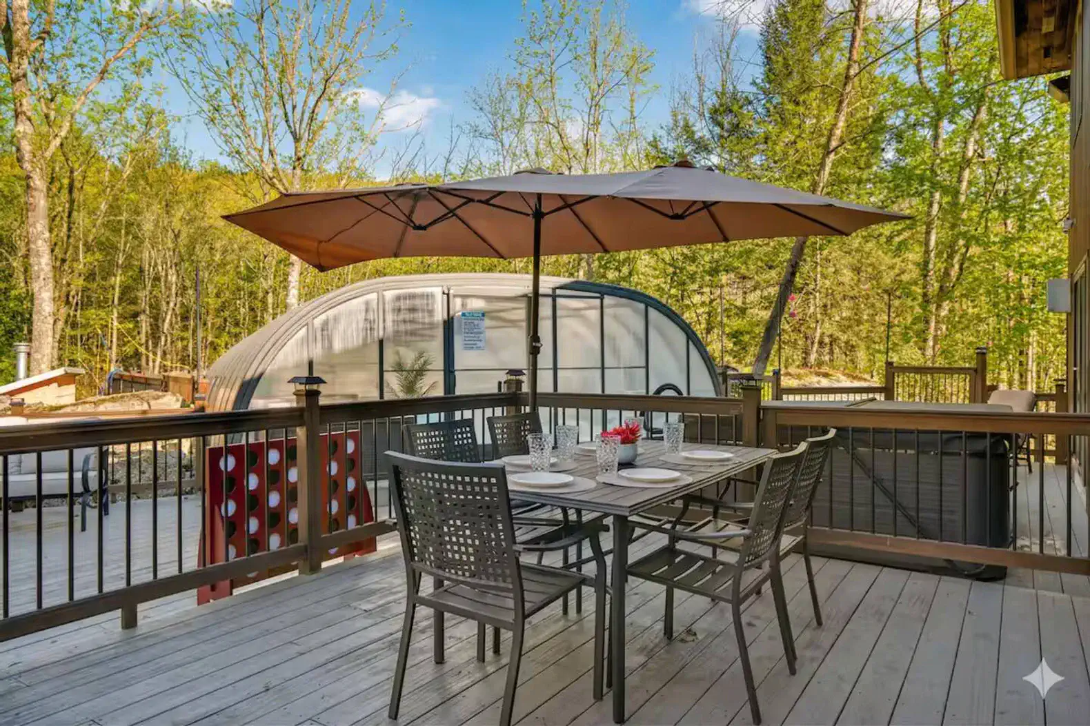 Forest-view deck with dining, hot tub & enclosed pool access