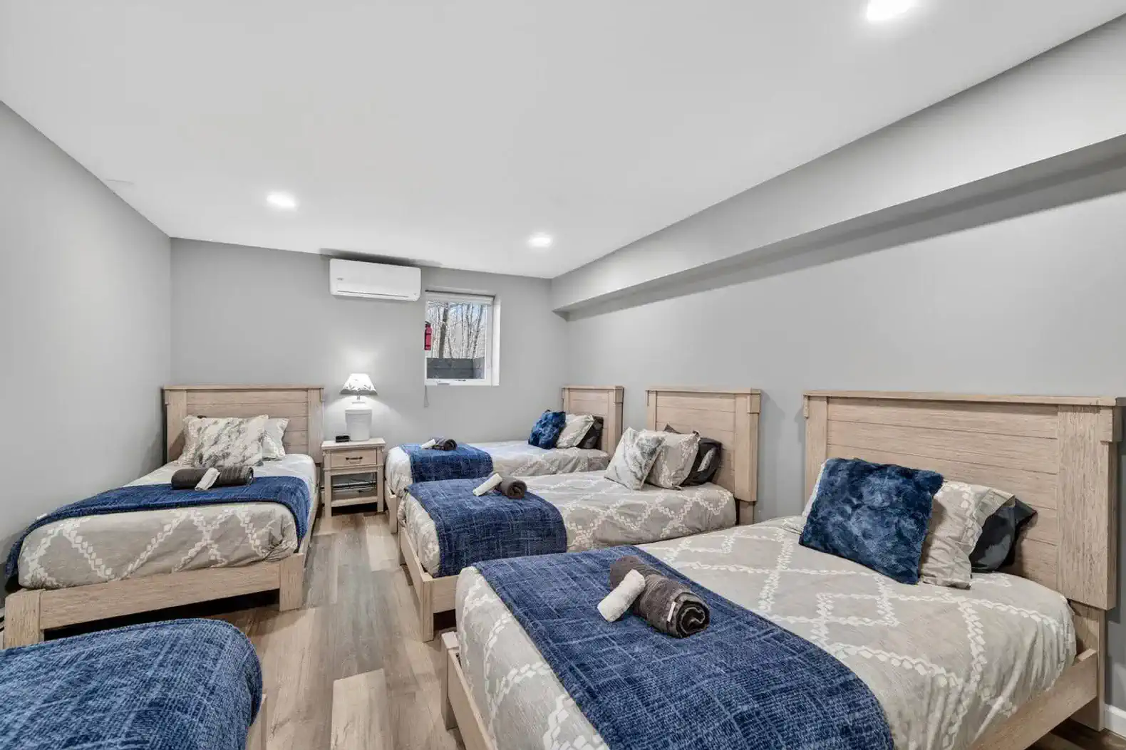Spacious bunk-style room with 5 twin beds & A C—great for groups
