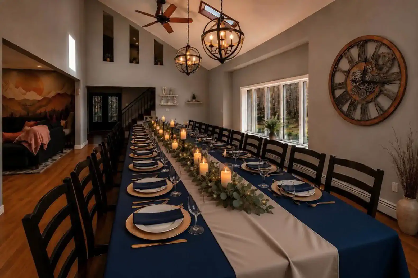 Long dining table set with candles and elegant tableware in a spacious dining area