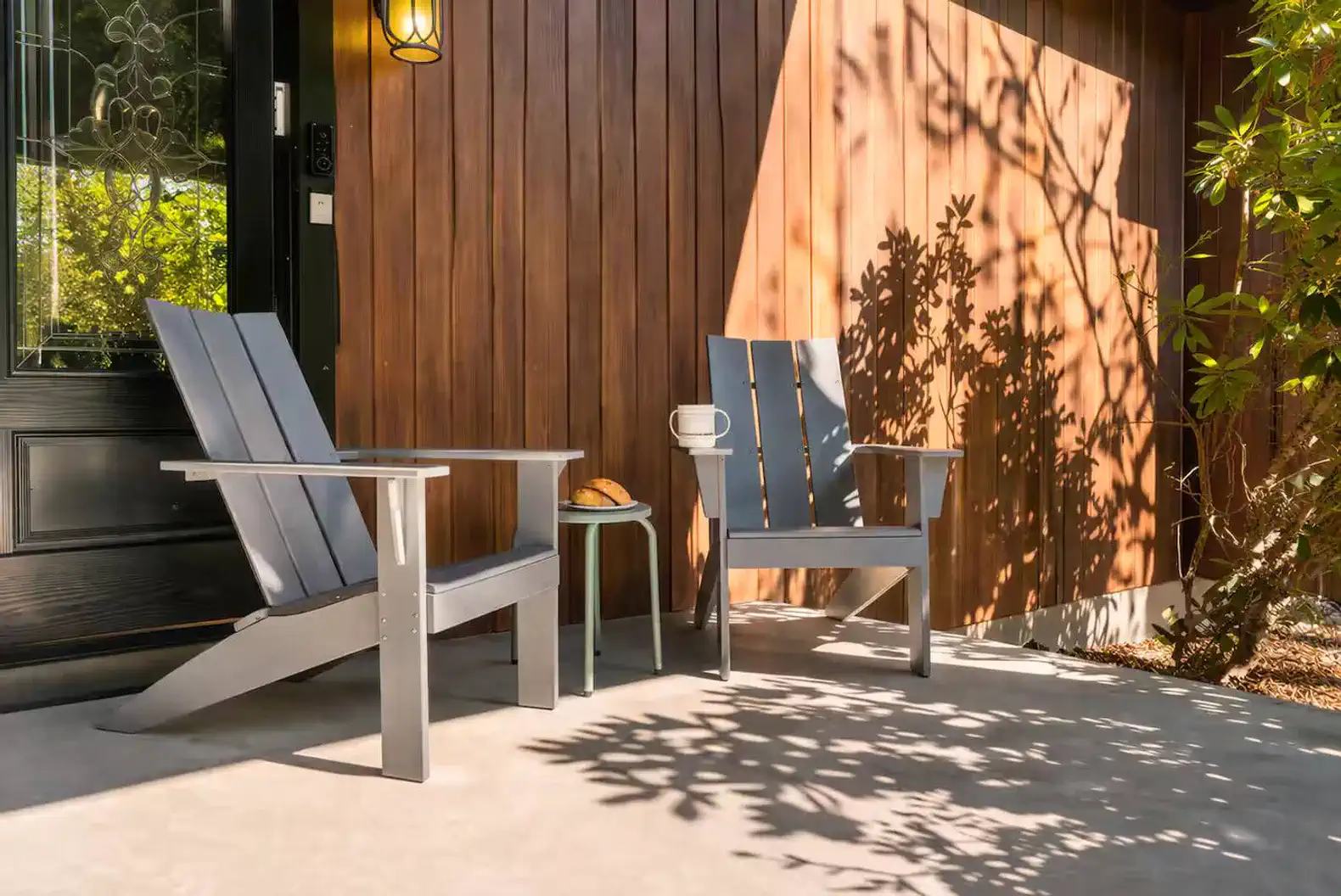 Charming front porch with Adirondack seating for morning coffee or evening relaxation