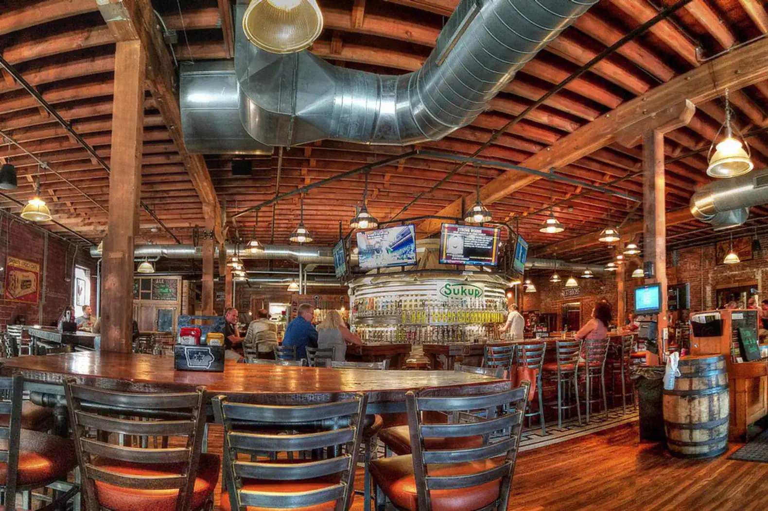 Try 100+ Iowa craft beers at The Iowa Taproom, just down the street. Great vibes, food, and a historic brick-and-beam setting.