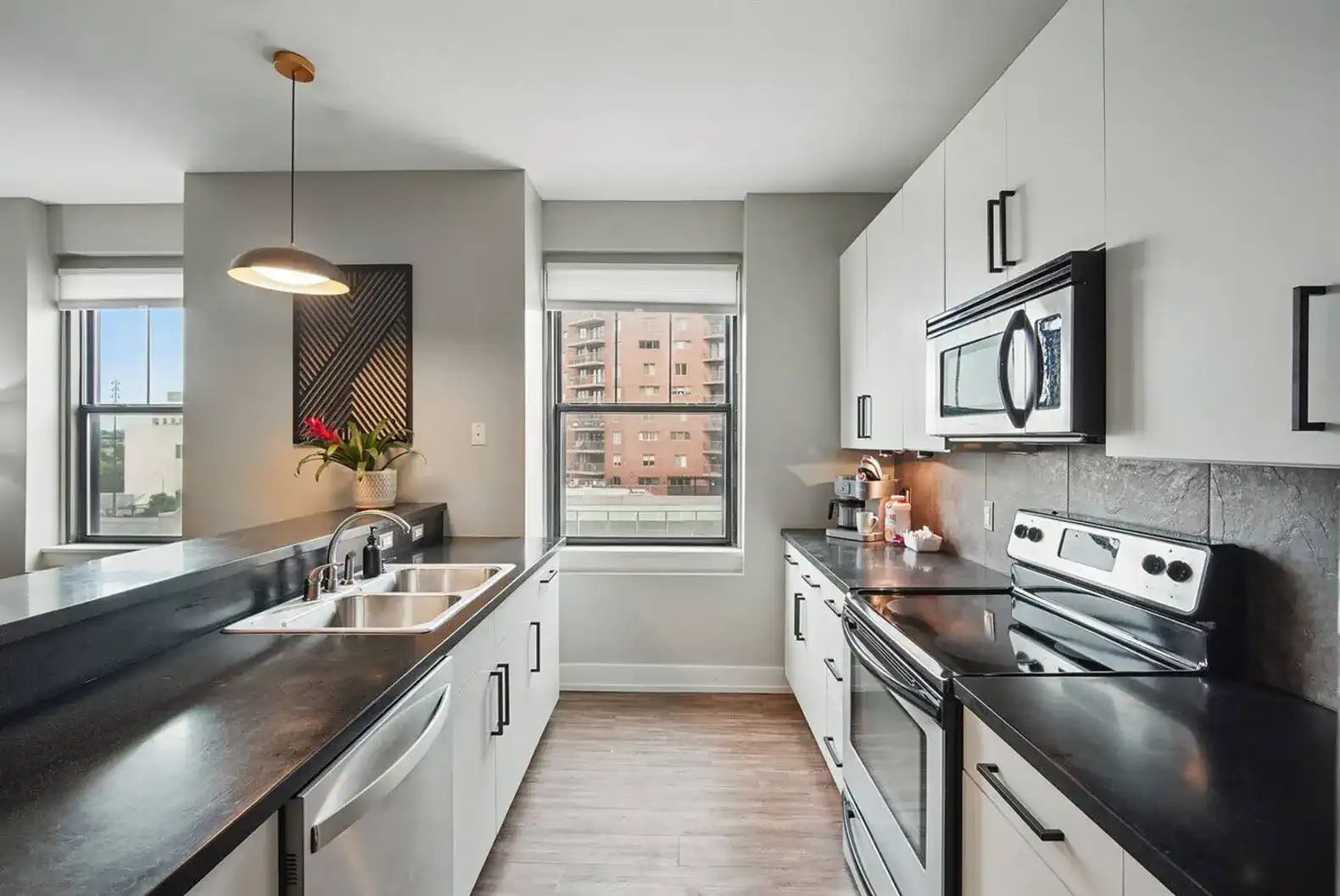 A functional and beautifully designed kitchen with bar seating, full-size appliances, and all the essentials for your stay.