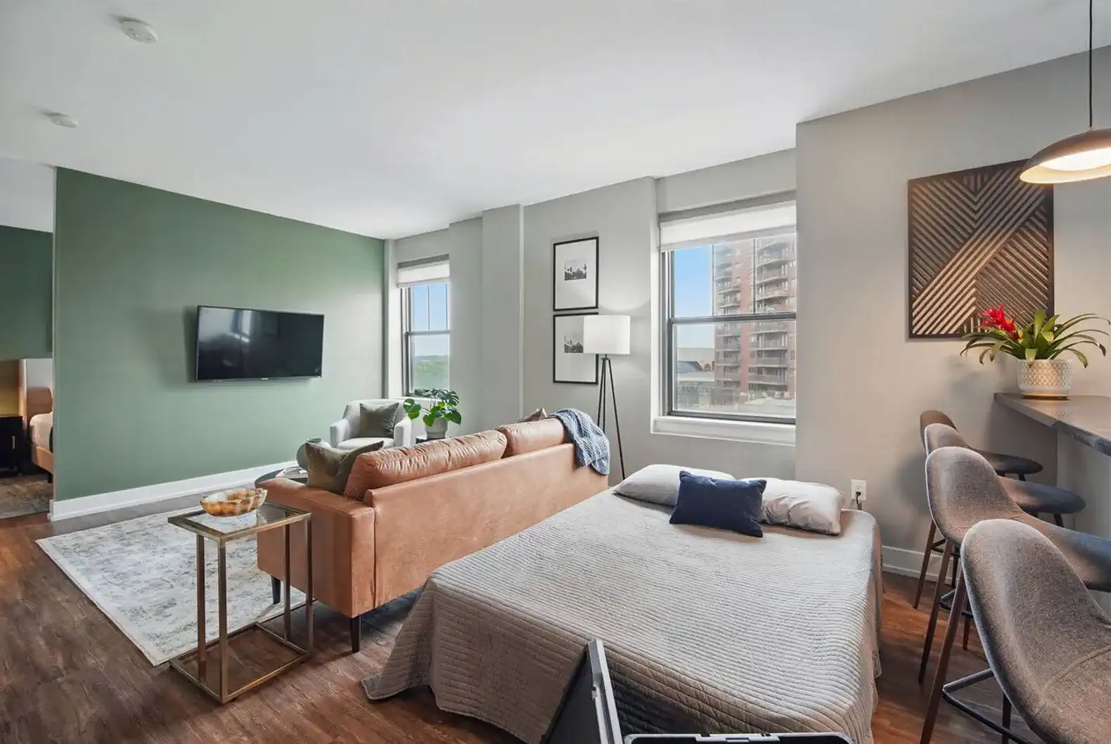 The sofa converts into a comfortable full-size bed, ideal for additional guests without compromising style or space.
