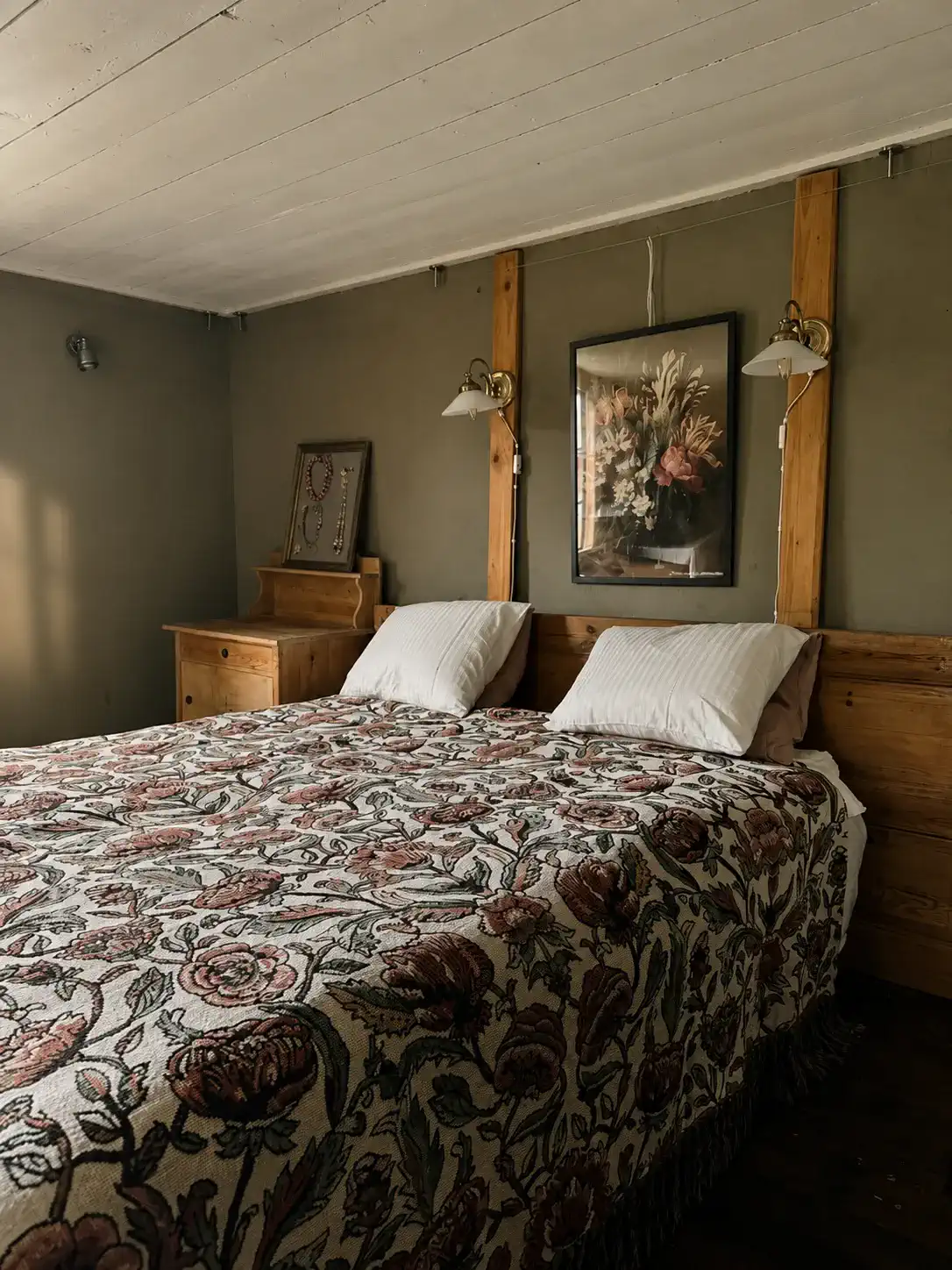 Cozy master bedroom with floral bedding and wooden accents