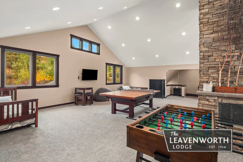 The upstairs loft: foosball, the pool table and the day beds