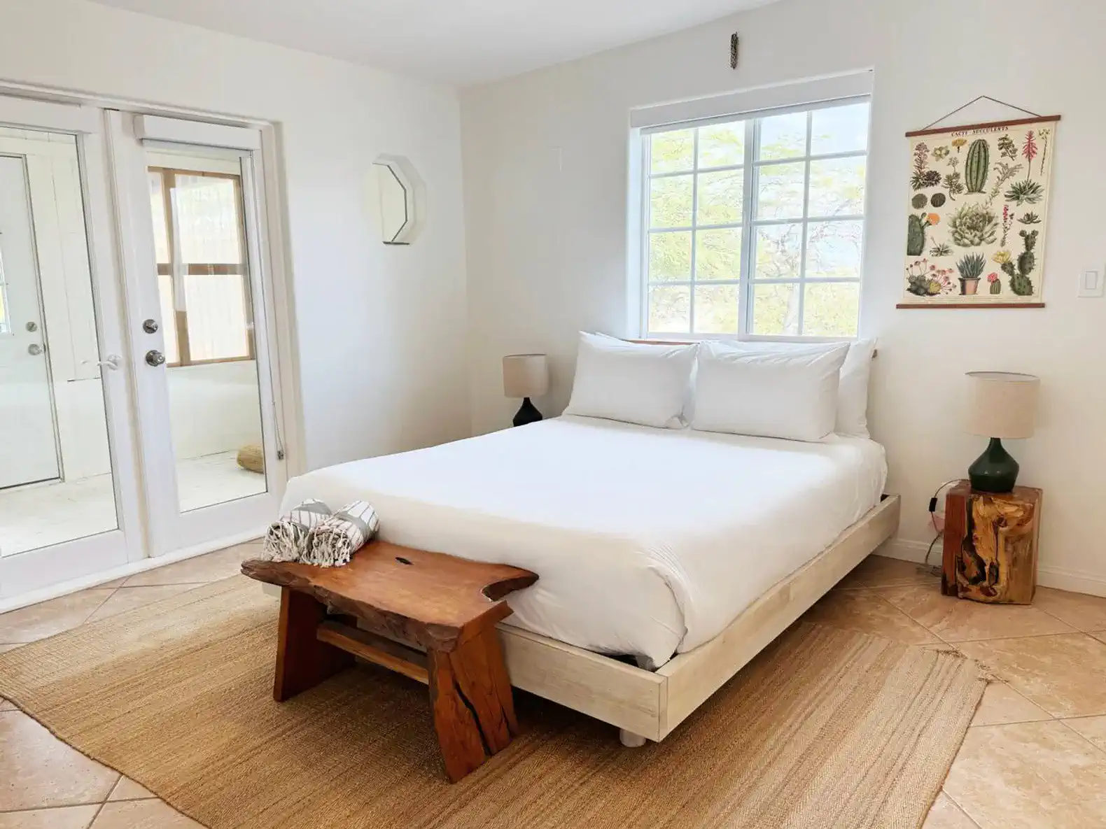 The light-filled front bedroom has a private enclosed patio/meditation room, as well as access to the front porch and hot tub. All bedrooms feature high-quality linens, feather pillows, and blackout roller shades.