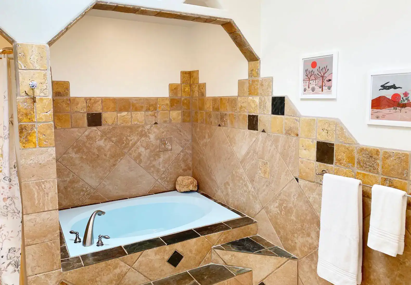 Large soaking tub in the primary en suite bathroom.