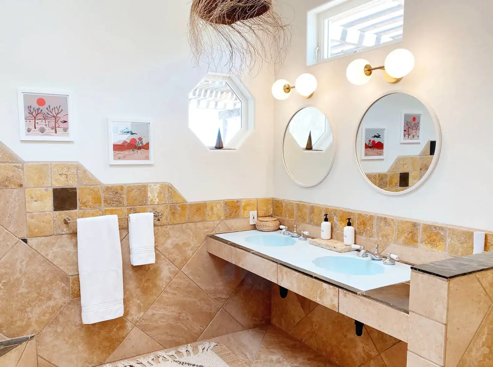 Dual sinks in the primary bedroom en suite bathroom.