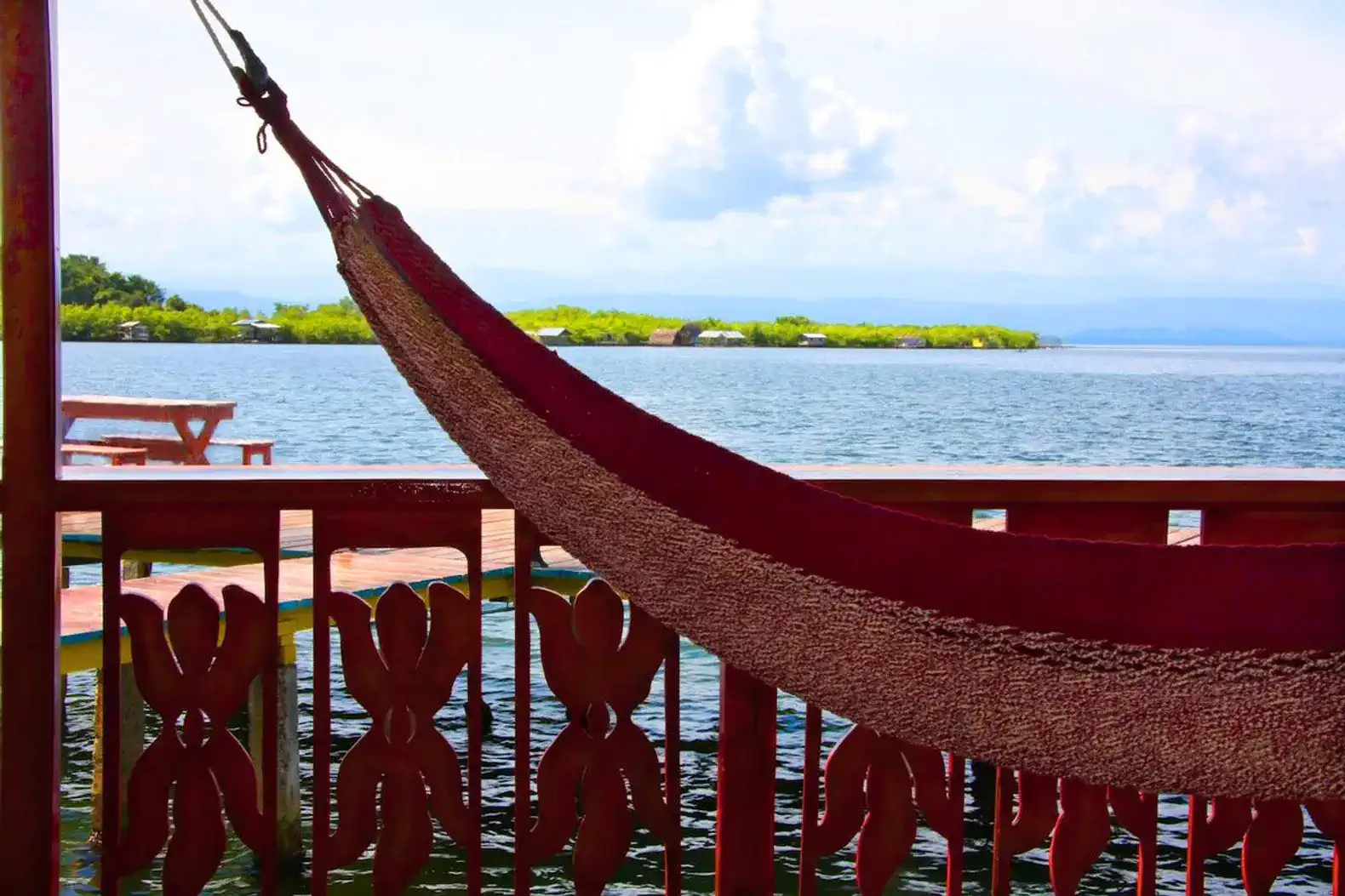 Hammock overlooking the serene sea view with distant islands