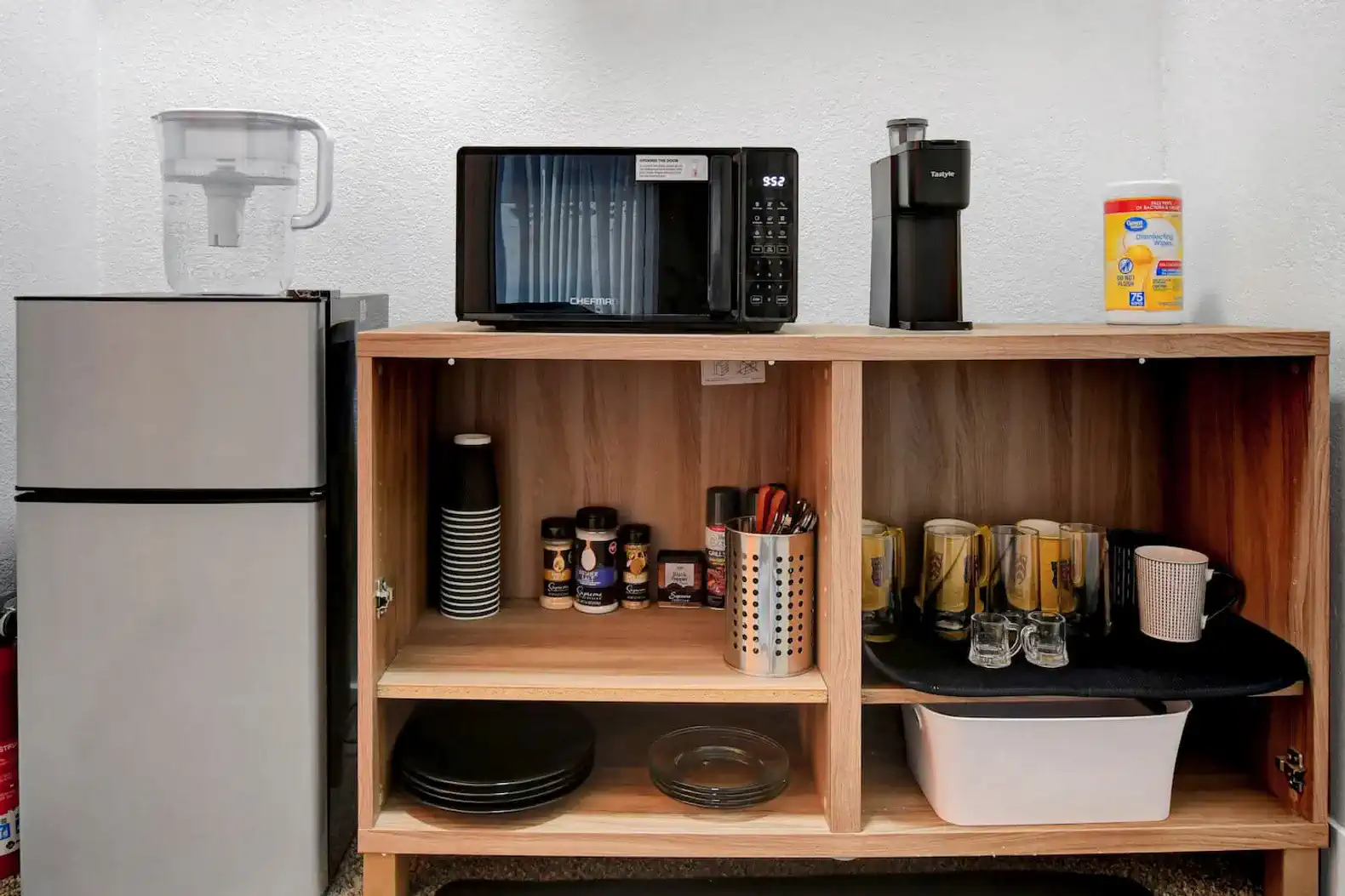 Common area with mini fridge, coffee machine, and microwave