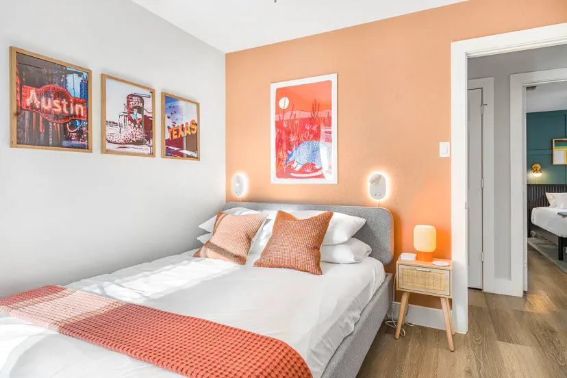 Bedroom 3 with Queen Helix Midnight Lux hybrid mattress for cozy, comfortable sleeping plus smart TV.