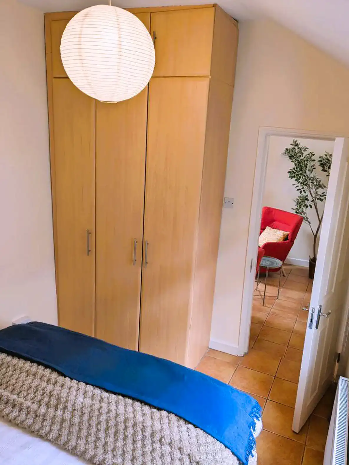 Cozy bedroom with a large wardrobe