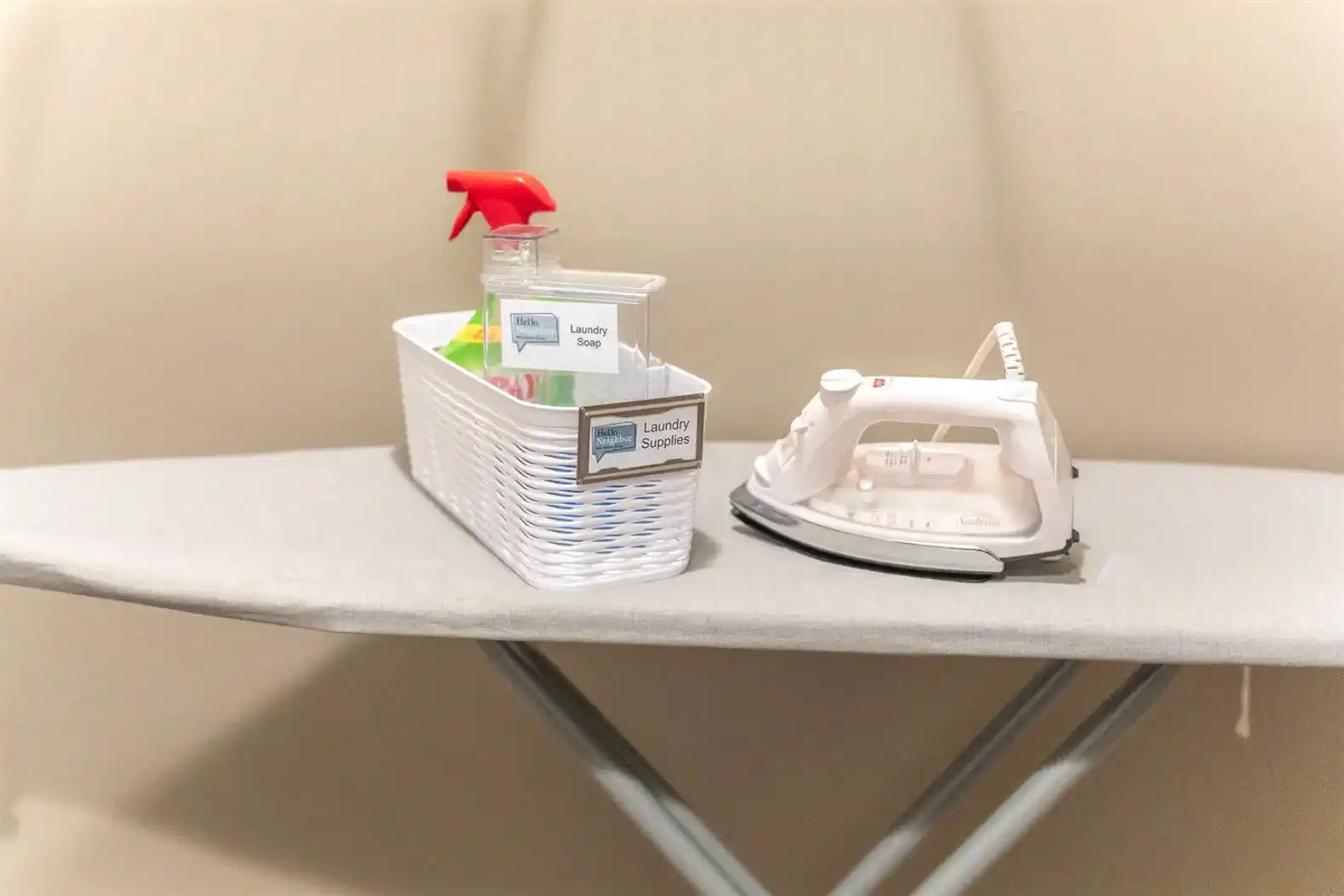 An iron, ironing board, drying rack, detergent and more are also provided!