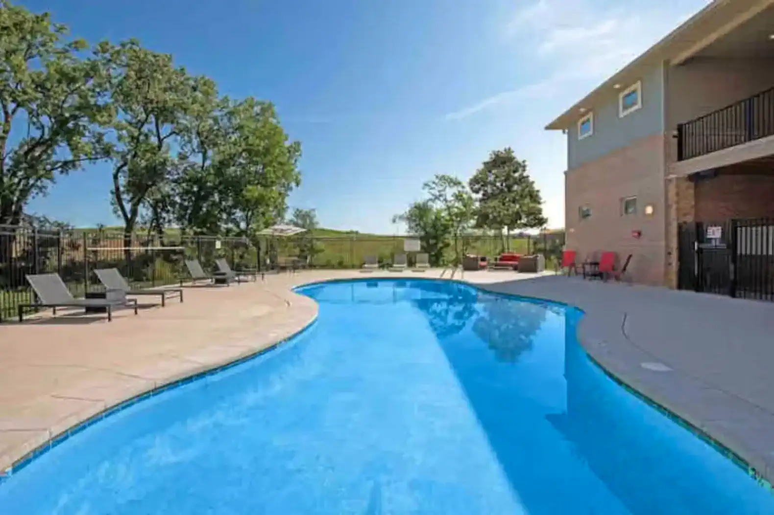 Enjoy access to a well-maintained community pool with ample seating and open views—ideal for a refreshing swim, soaking up the sun, or relaxing after a busy day.