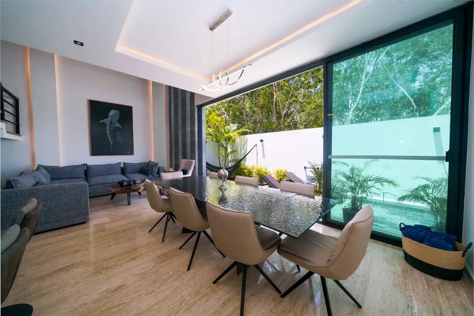 Dining Room for 8 Guests: Gather around a large dining table that comfortably seats 8, ideal for family meals or special dinners.