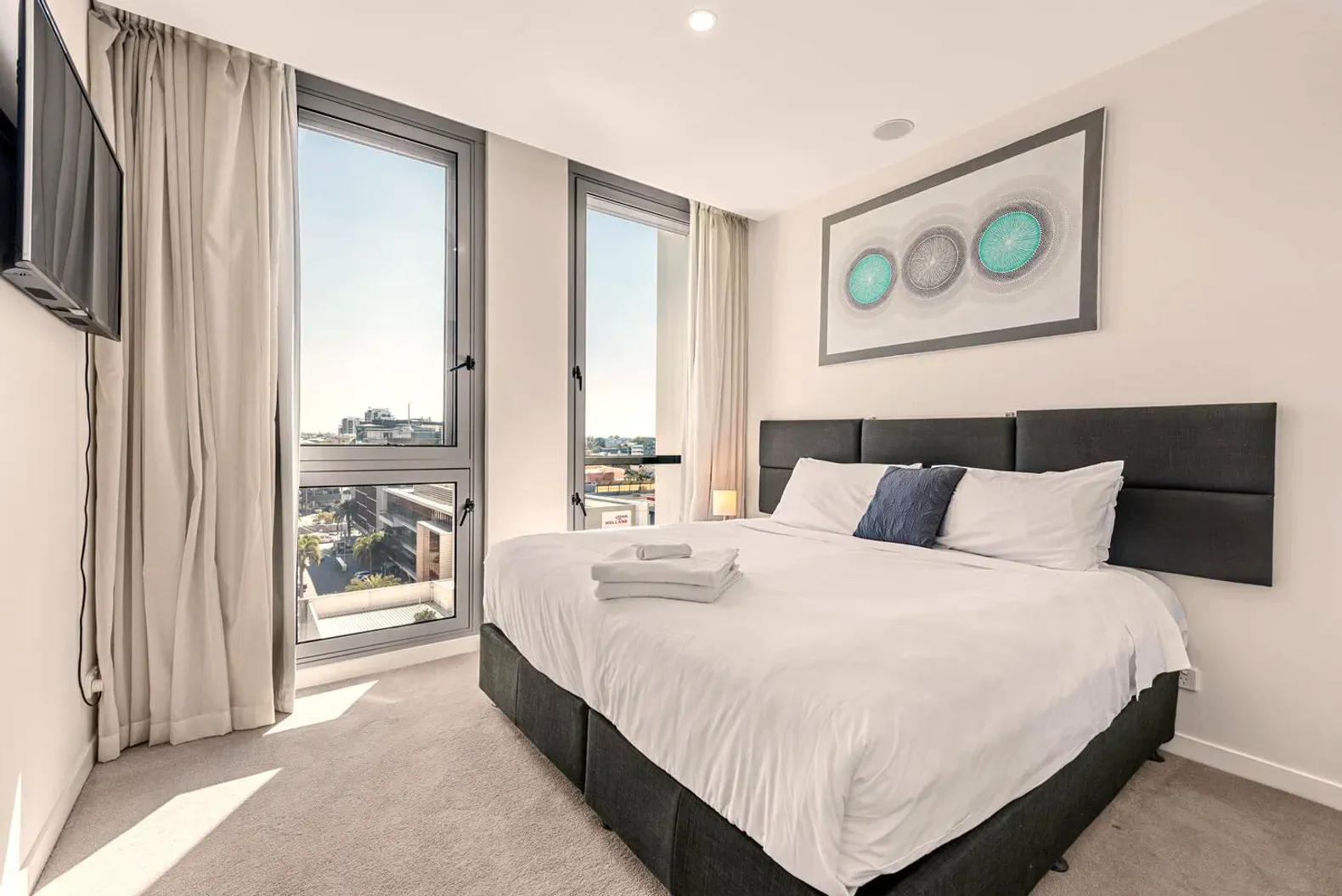 Alex Perry | 2BR Escape + Pool, Gym & Free Parking — Newstead, Queensland — vacation rental