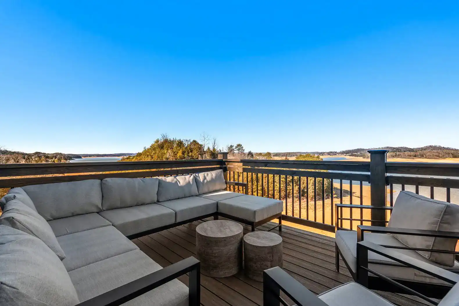Spacious outdoor seating area with lake views
